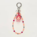Keychain with cartoon character and beaded chain on a white background