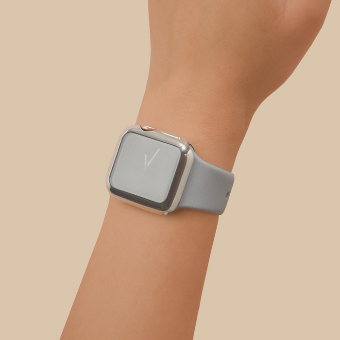 Silver Coconut Lane 2-in-1 metallic Apple Watch case and screen protector on a wrist with a blank watch screen.