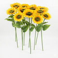 Bouquet of artificial sunflowers on a white background