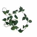 Artificial green leaf garland on a white background
