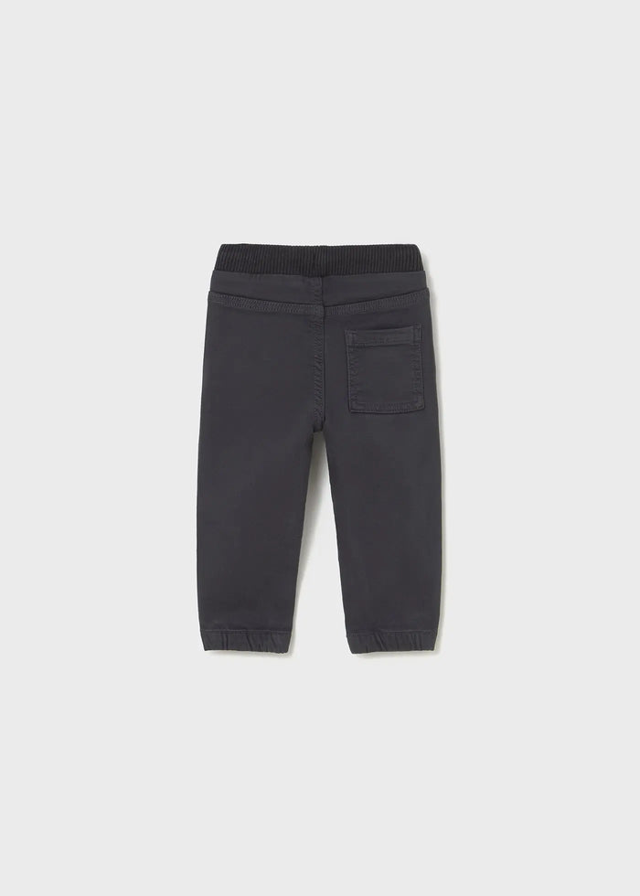 Flat view of Mayoral baby boy twill joggers showing tapered leg shape and solid charcoal color.