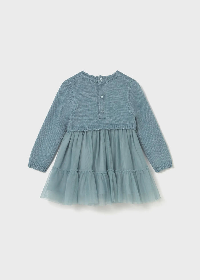 Back view of Mayoral baby girl knit tulle dress showing button closure and layered skirt.