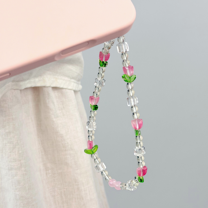 cute tulips phone strap attached to a phone