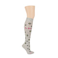 Knee-high gray compression socks with bee patterns and "Bee Kind" text in pink.