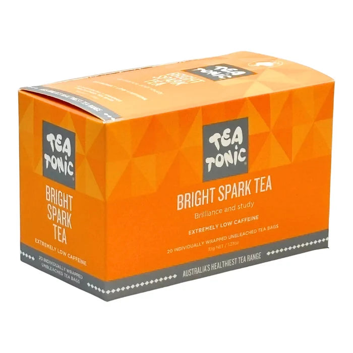 A box of Tea Tonic Bright Spark Tea on a plain white background with geometric orange packaging. Extremely low caffeine, 20 individually wrapped unbleached tea bags.