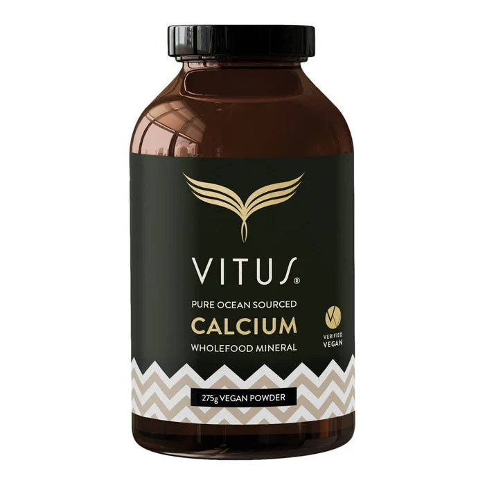 VITUS calcium powder 275g in a brown glass supplement bottle on a white background.