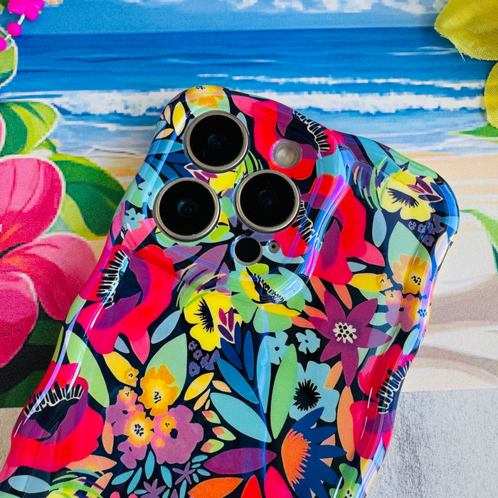Electric Paradise MagSafe iPhone case with bright neon florals on black background by Fancy Bands