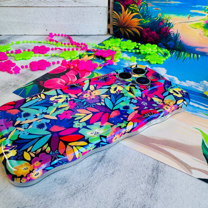 Electric Paradise MagSafe iPhone case with bright neon florals on black background by Fancy Bands