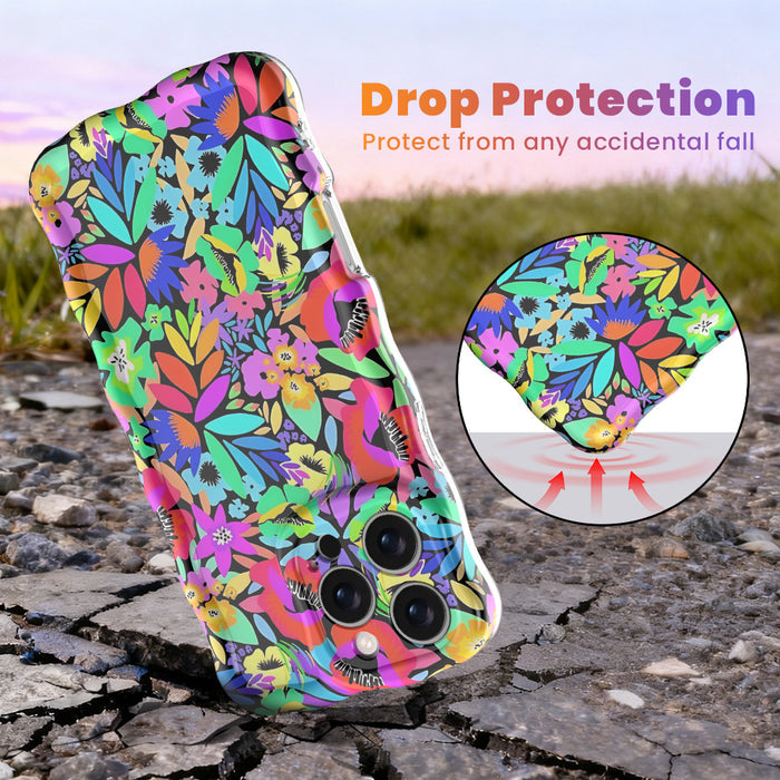 Electric Paradise MagSafe iPhone case with bright neon florals on black background by Fancy Bands