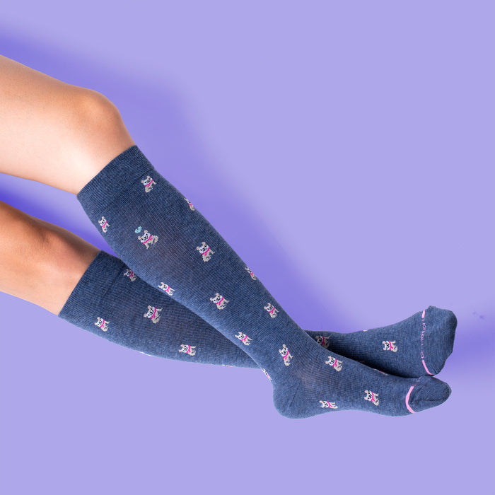 Knee-high compression socks with a blue background and French Bulldog patterns, featuring pink accents.