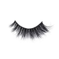 A single false eyelash strip with thick, long, wispy black lashes, slightly curved for a dramatic look against a white background.