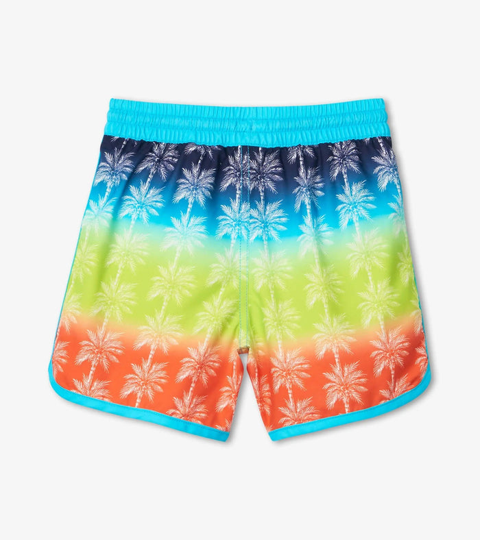 Back view of Hatley boys Gradient Palms swim shorts with tropical palm print