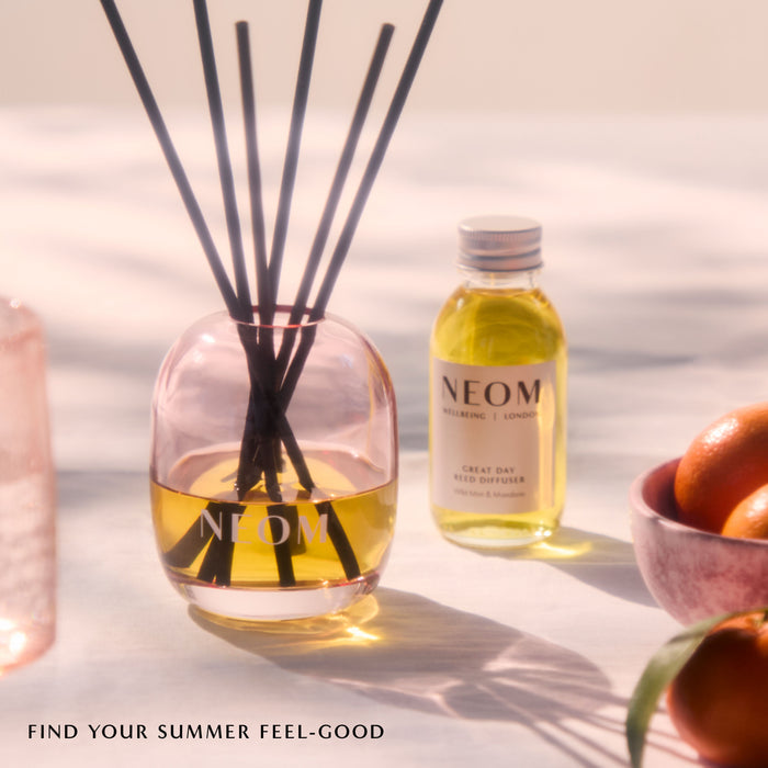 "Great day reed diffuser. Text says 'find your summer feel-good'"