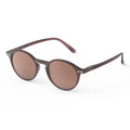 Round sunglasses with brown lenses on a white background