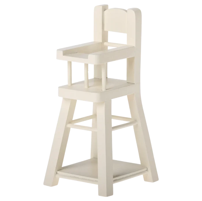 White wooden high chair on a white background
