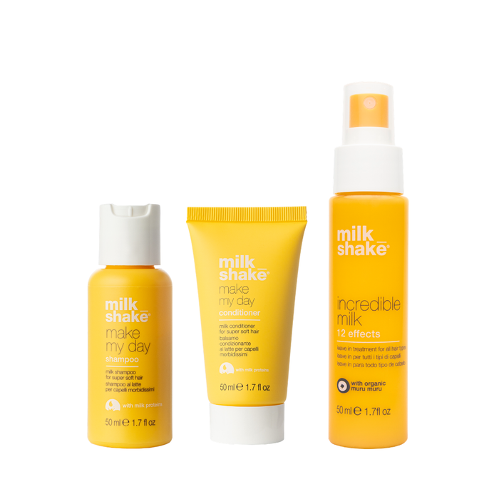 Three bottles of milk shake hair care products on a white background make my day and incredible milk