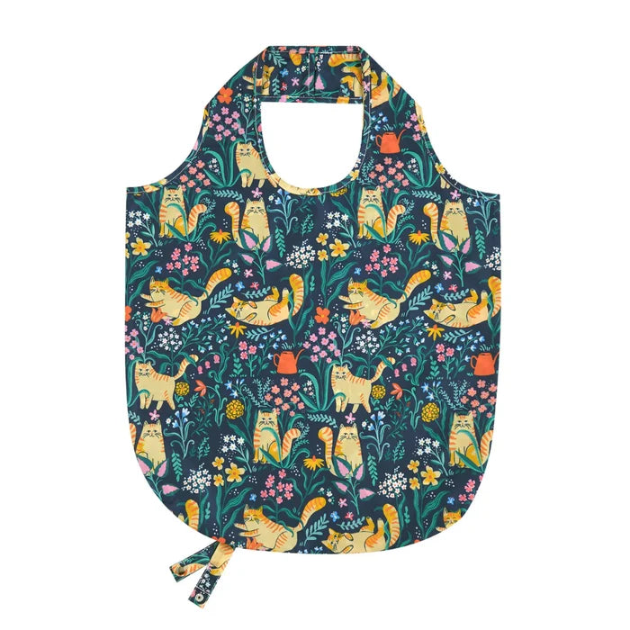 Reusable shopping bag with cat and floral pattern on a white background