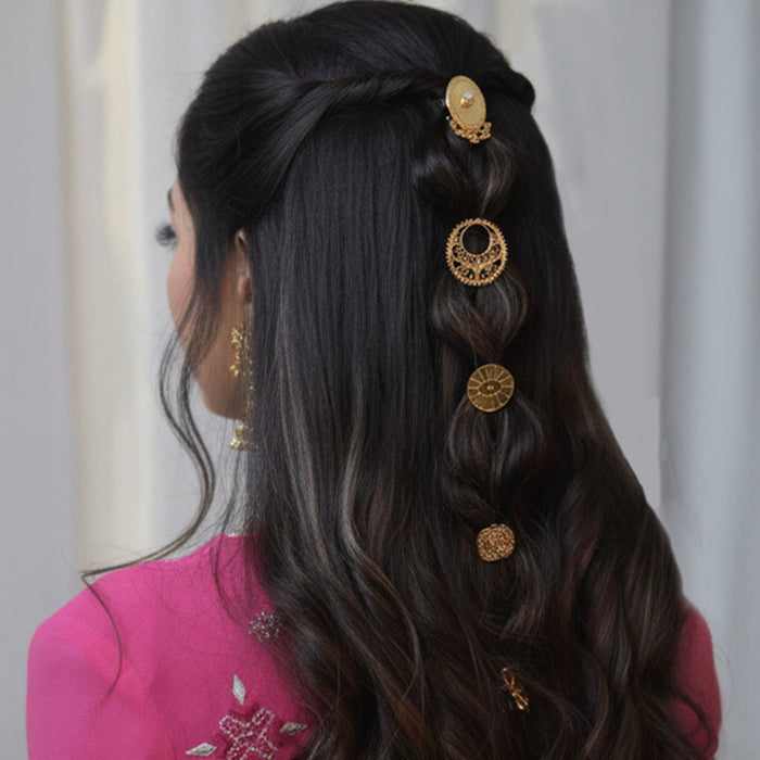Golden Mohar juda hair pins adding regal charm and elegance to bridal buns and braids