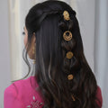 Golden Mohar juda hair pins adding regal charm and elegance to bridal buns and braids