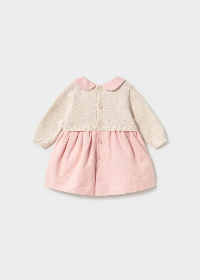 Back view of Mayoral baby girl Ivory Pink knit dress with sweet collar and gathered skirt.