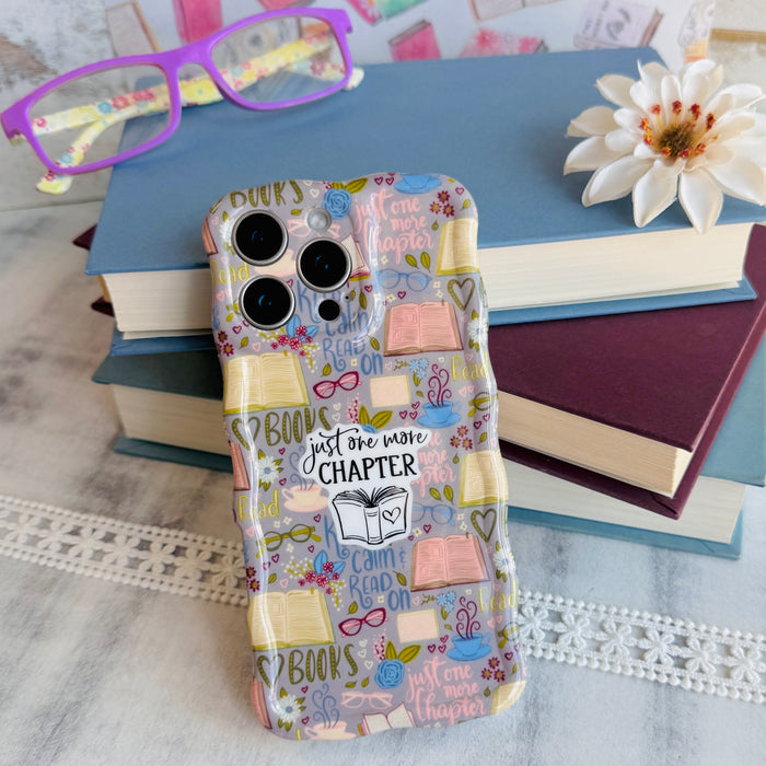 One More Chapter MagSafe iPhone case with books, reading glasses, and book quotes by Fancy Bands