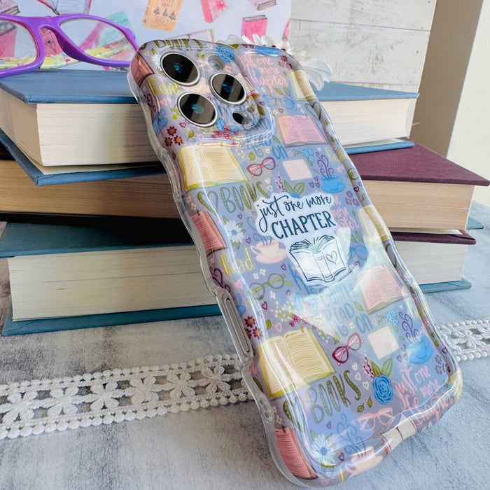 One More Chapter MagSafe iPhone case with books, reading glasses, and book quotes by Fancy Bands