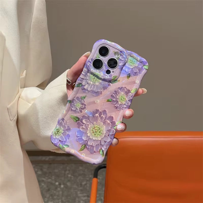 Lavender wavy iPhone case featuring large painterly purple flowers with green centers and leaves.
