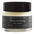 A 15g glass jar of Perfect Potion Rejuvenating Eye Cream with a black lid and black label, on a white background.