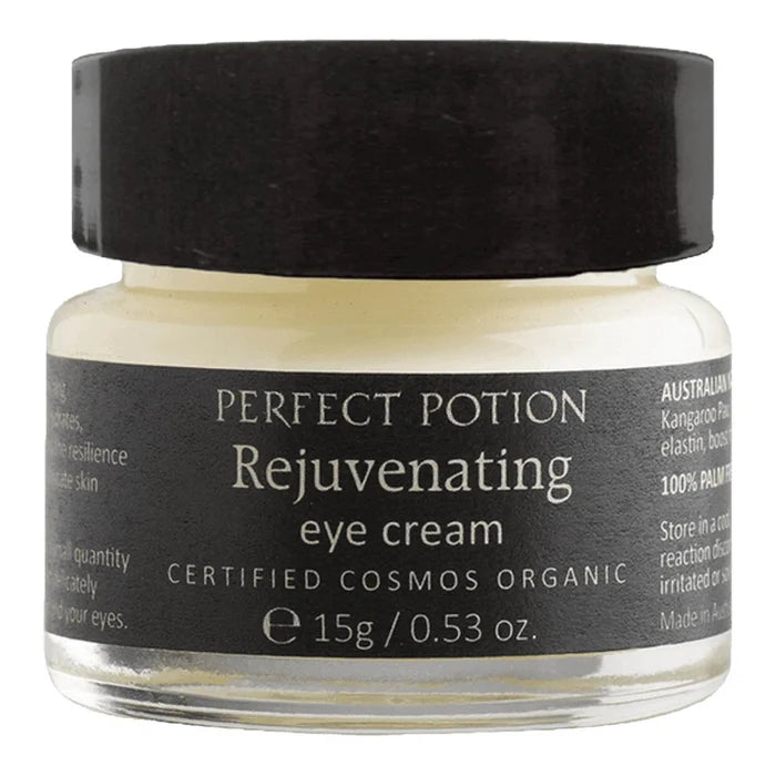 A 15g glass jar of Perfect Potion Rejuvenating Eye Cream with a black lid and black label, on a white background.