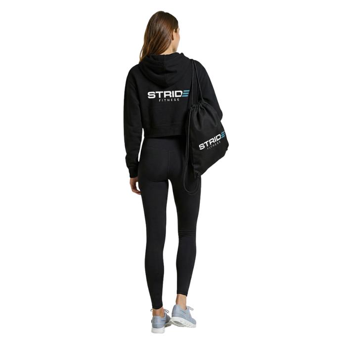 Black STRIDE Fitness drawstring gym bag designed for lightweight storage of workout gear, shoes, and daily essentials