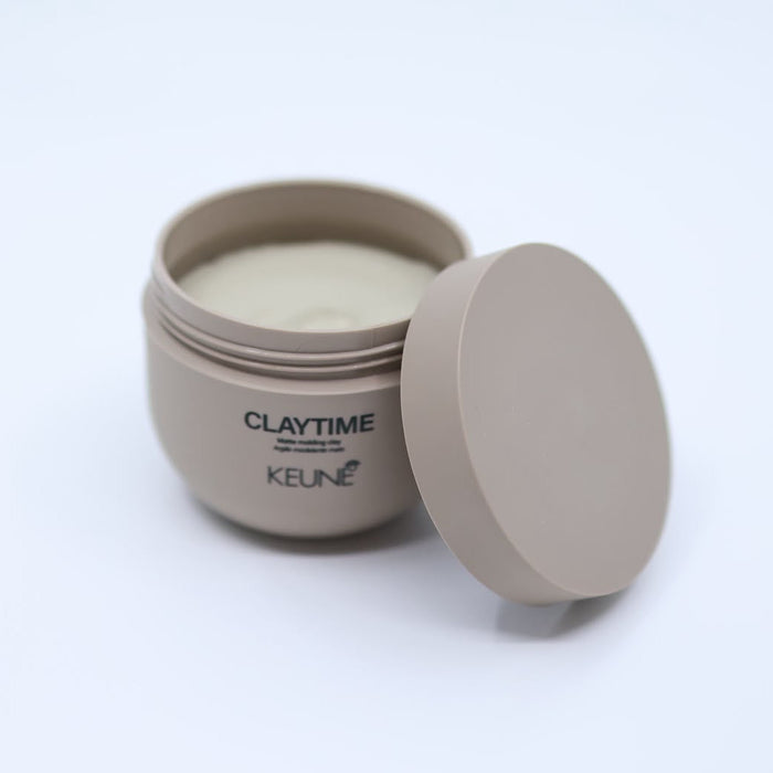 De Keune Style heeft een bruine textuur. Care For Hair.