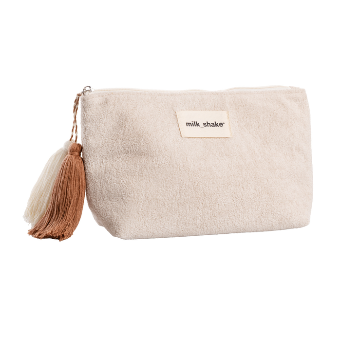 Beige pouch with a tassel and 'milk_shake' label on a white background
