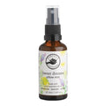 A 50ml amber glass spray bottle of Perfect Potion 'Sweet dreams pillow mist' with a black spray cap and a white label decorated with yellow and purple floral illustrations.