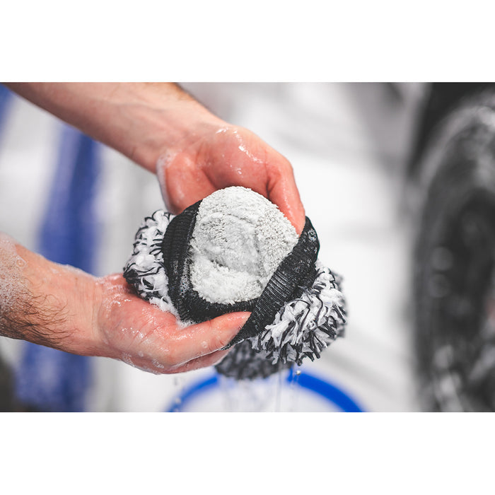 Interior of a black and white microfiber wash mitt