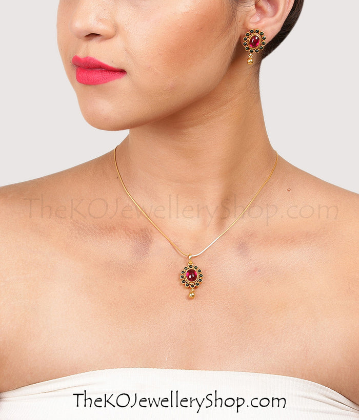 Tiny gold plated temple jewellery pendant for office wear
