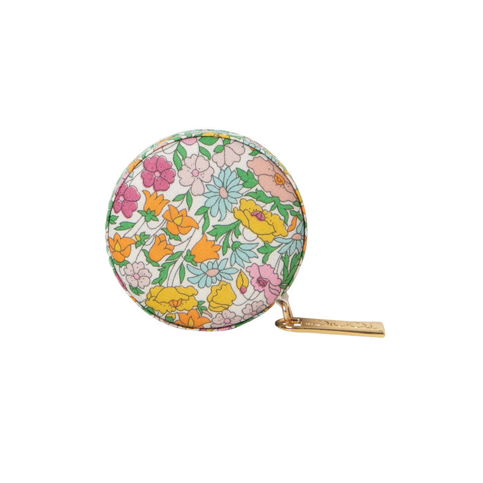Round floral measuring tape on a white background