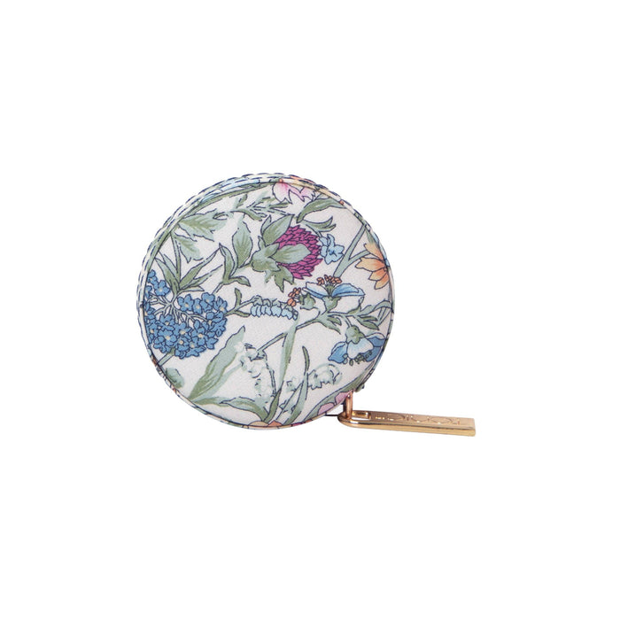 Round floral-patterned measuring tape on a white background