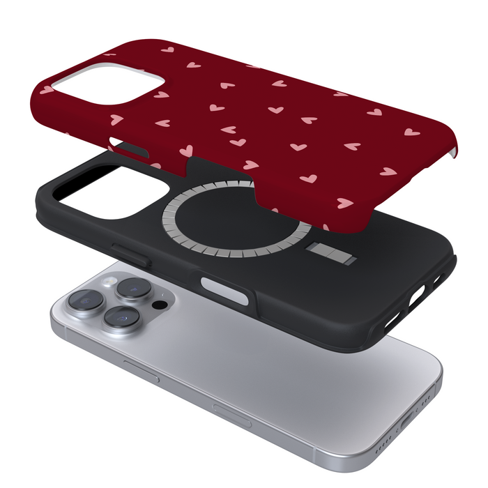 Coconut Lane Tough MagSafe phone case, mulberry with red heart pattern, black inner layer shown in exploded view.