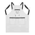 StyleCraft Pro Apron White apron with black straps and pockets on a white background